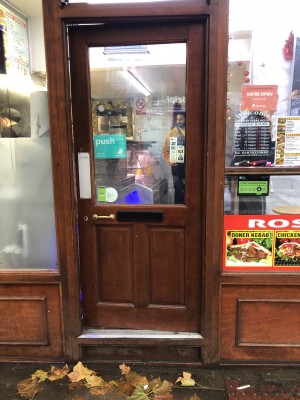 Photo of main entrance. Push on left to open. Counter is immediately to the left inside.