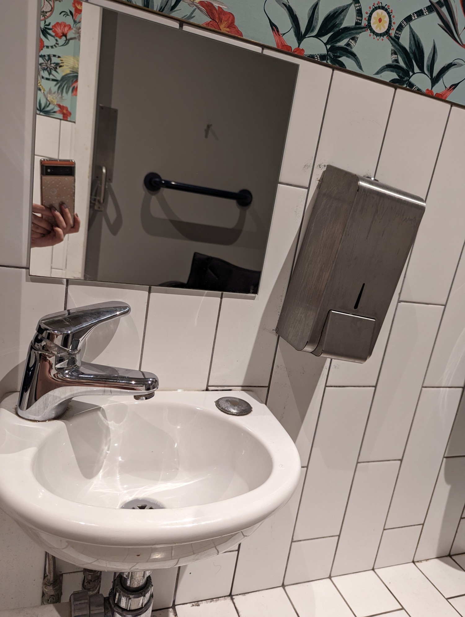 Lowered sink, soap and mirror