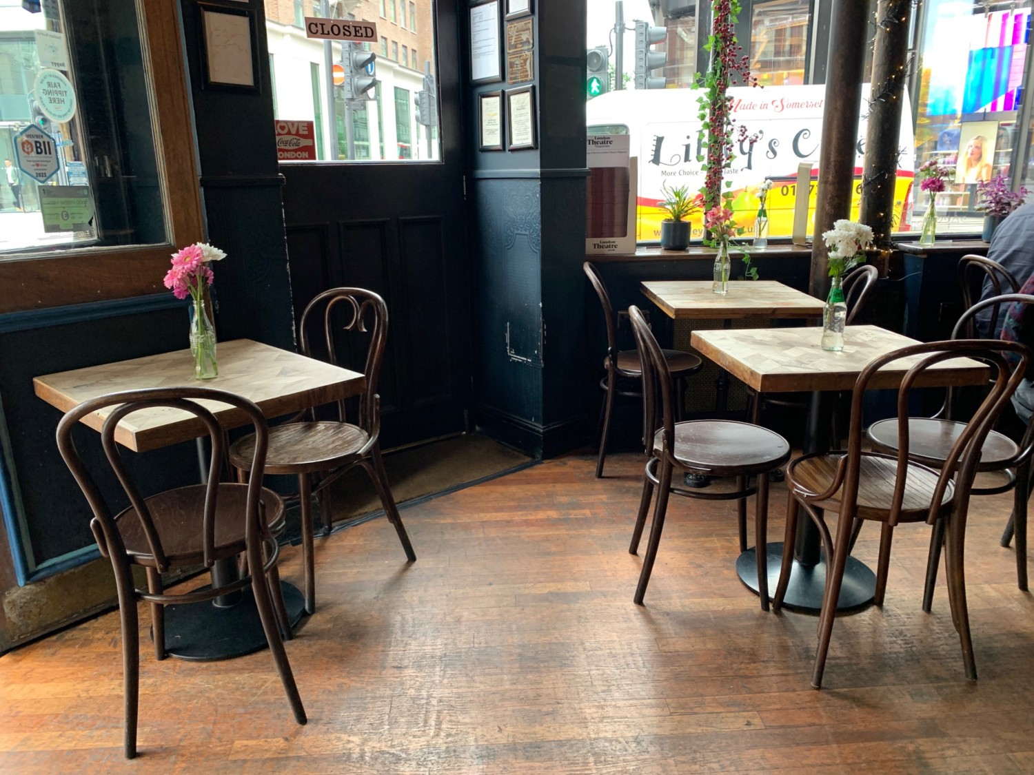 From entrance, looking left. Tables and chairs along back wall.