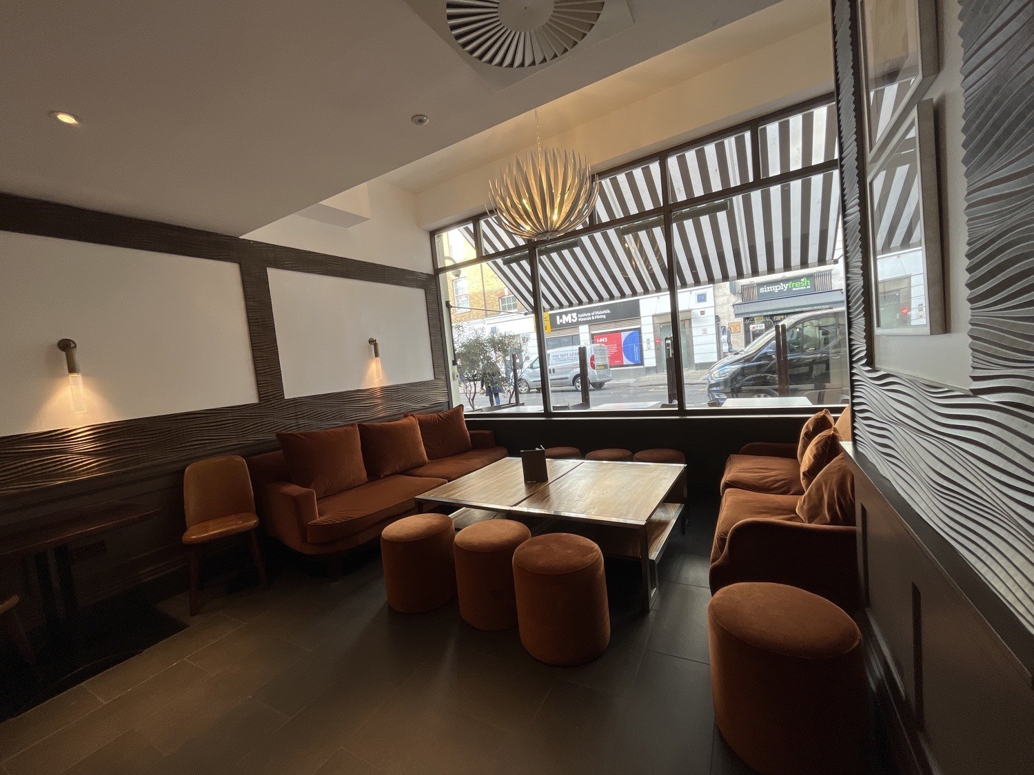 low tables, sofas and seating next to bar area
