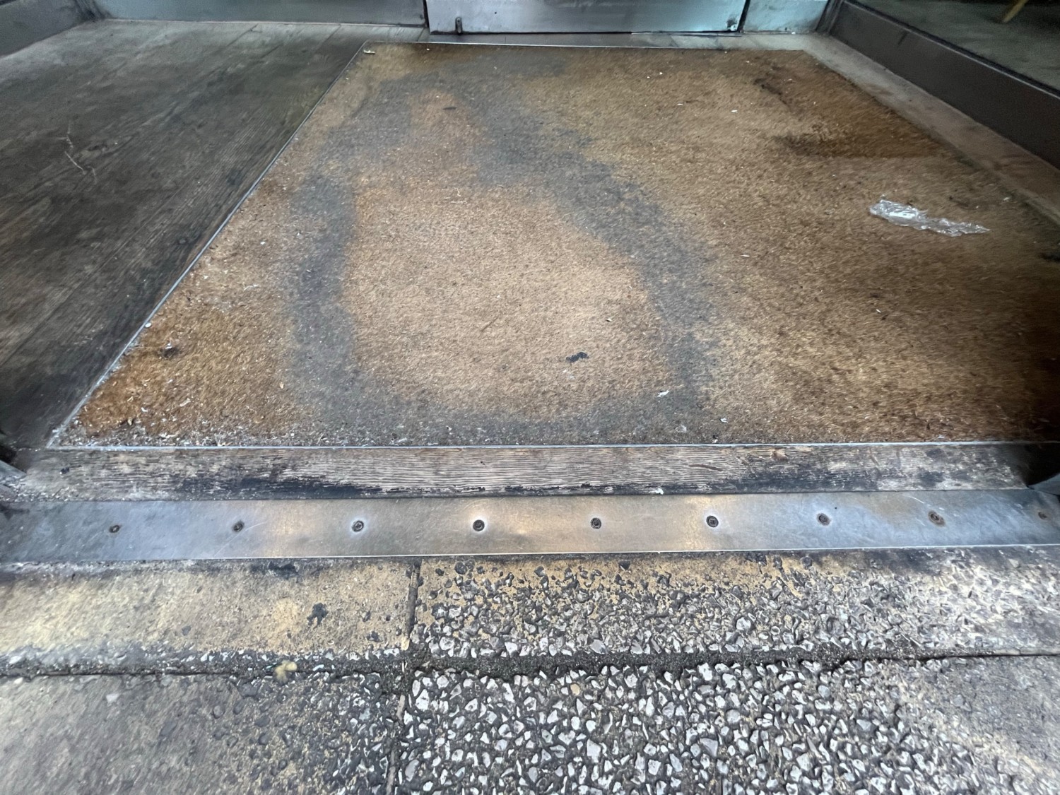 Small bump at foot of door.