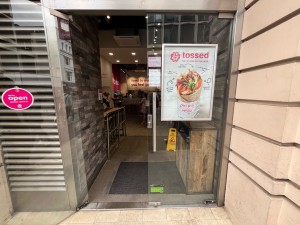 Glass doors. Pull open via handles in centre.