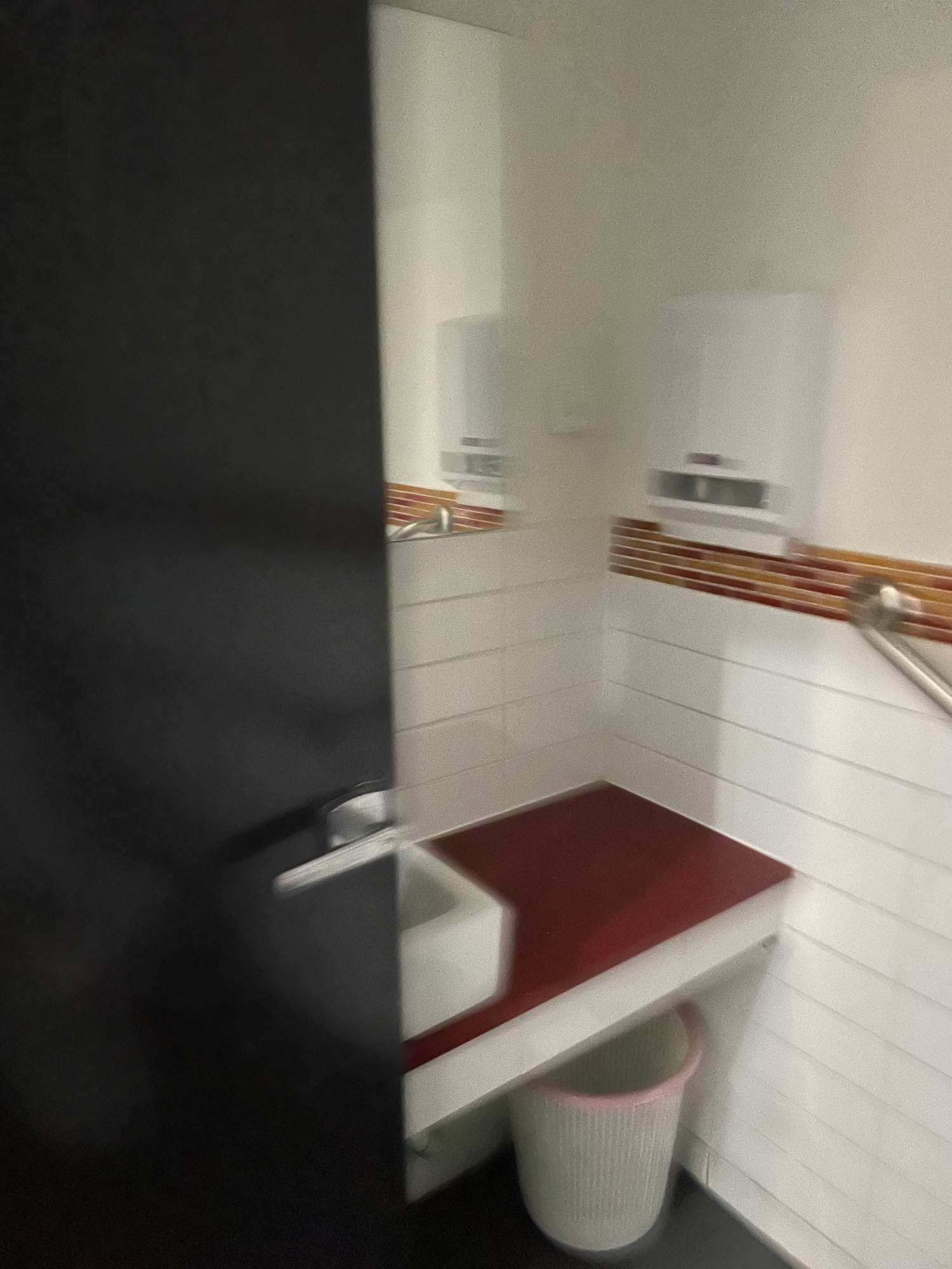 Sink area and door opens inward