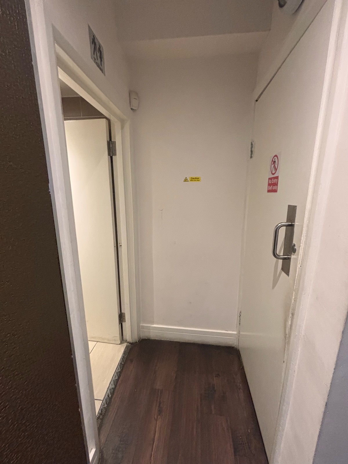 From after step facing right. Path ahead to bathroom at back left.