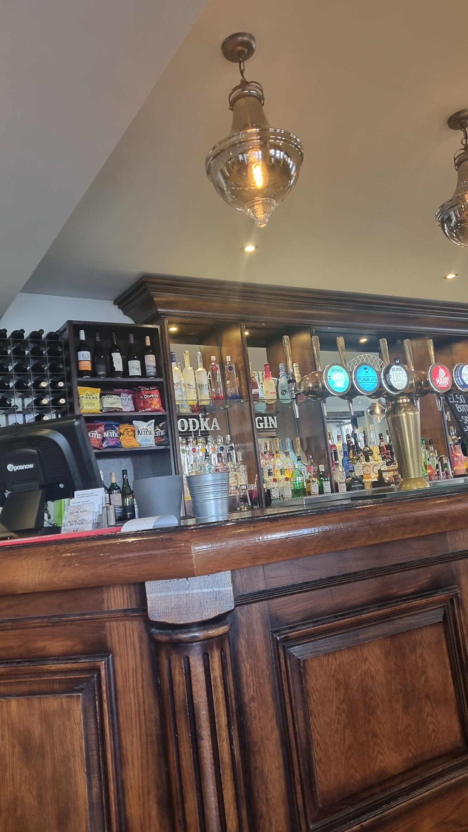 Lights above bar. Spotlights in ceiling elsewhere