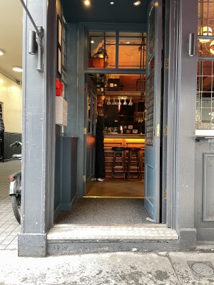 Main entrance with single step. Two sets of single doors opening inwards to the venue. Step has a colour-contrasted and textured step edge