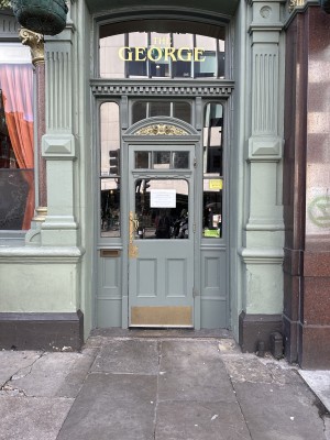View of the main entrance. The door has a handle on the left hand side.