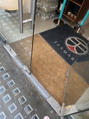 Close up of the small bump of the entrance, concerts as you enter on to a straw mat once you are inside.