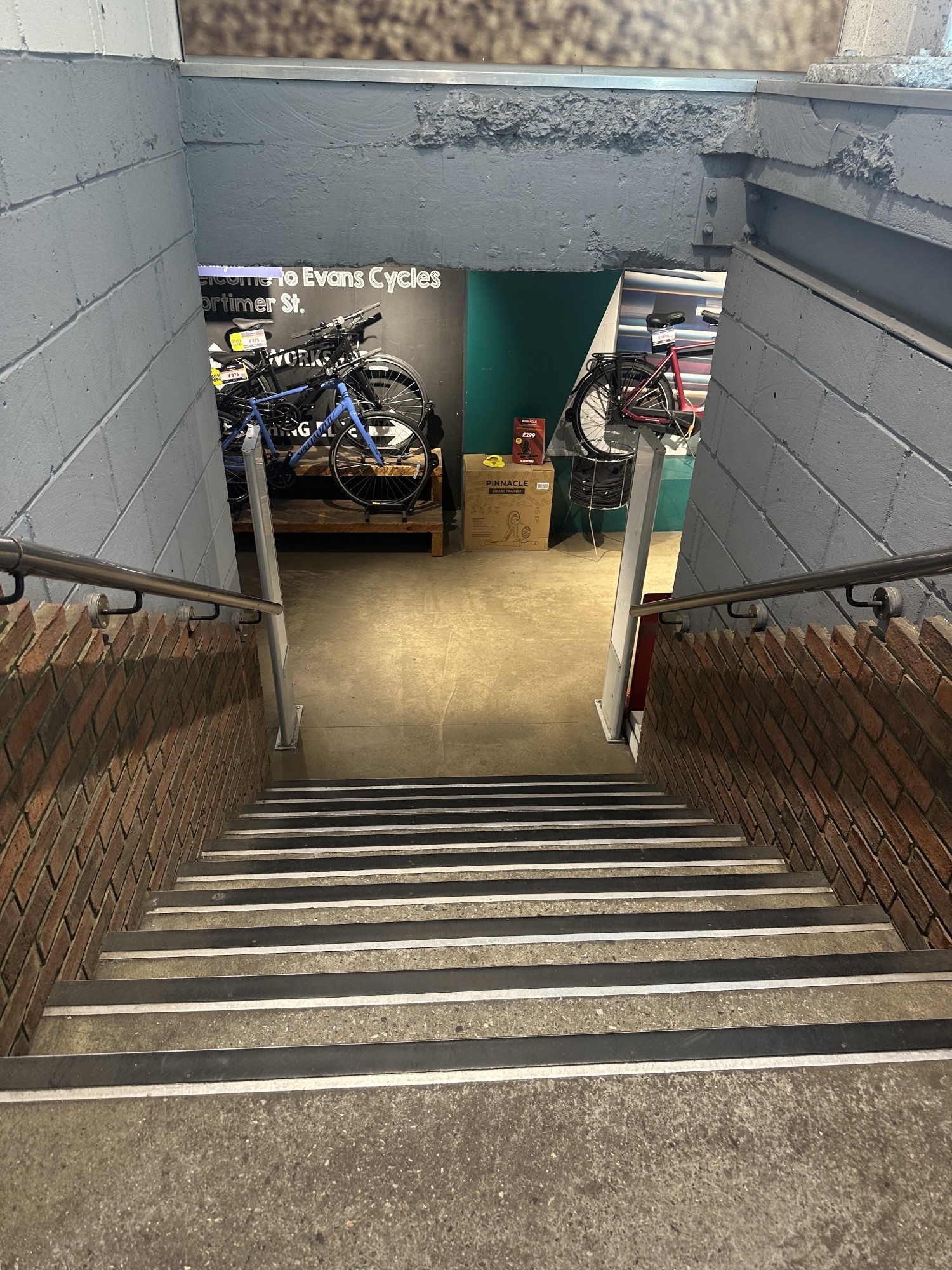 View of the downstairs area. To get to the downstairs, there are stairs with approximately 15 steps, there is a hand rail on both sides.