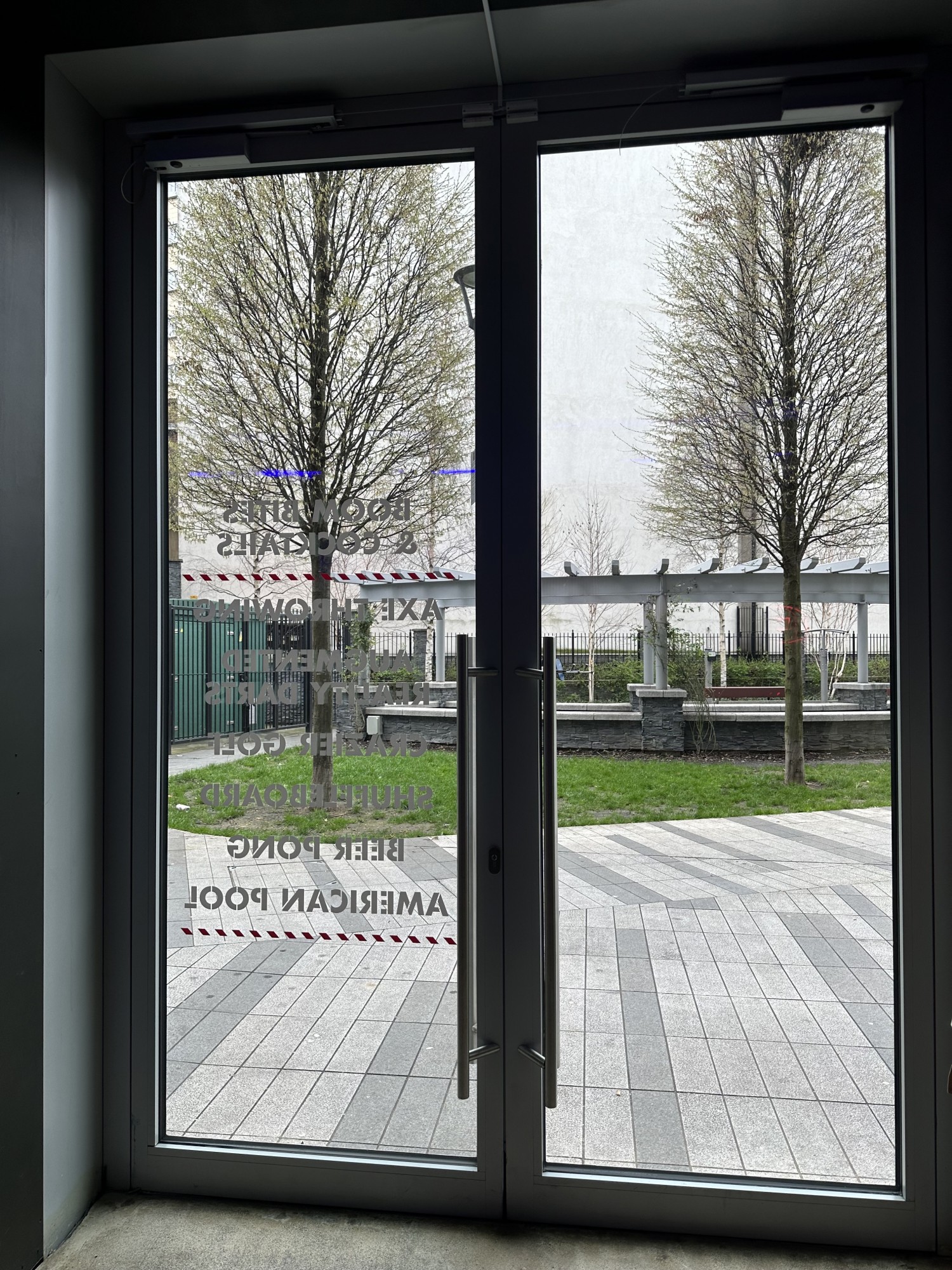 Alternative door available down the end of the bar. There is no call-for attention button at alternative entrance. Staff have advised to visit main reception area and they will assist