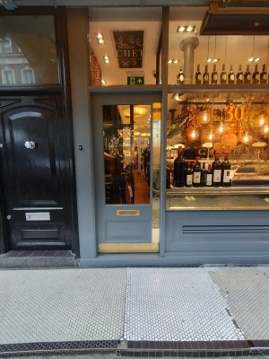 Picture of main entrance. You have to push the door open to the left. There is two small steps at the main entrance. After the first step, you have to go forward a bit before accessing the entrance door and taking the second step.