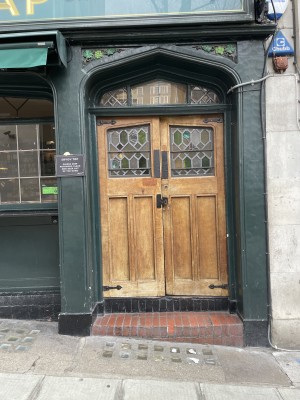View of the main entrance to the venue. This is located to the right of the venue front. There is two steps at the foot of the door. The door pushes open from the middle.