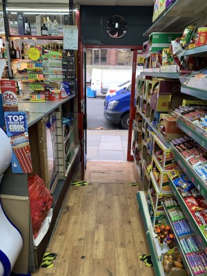 Regular single door entrance, slight incline