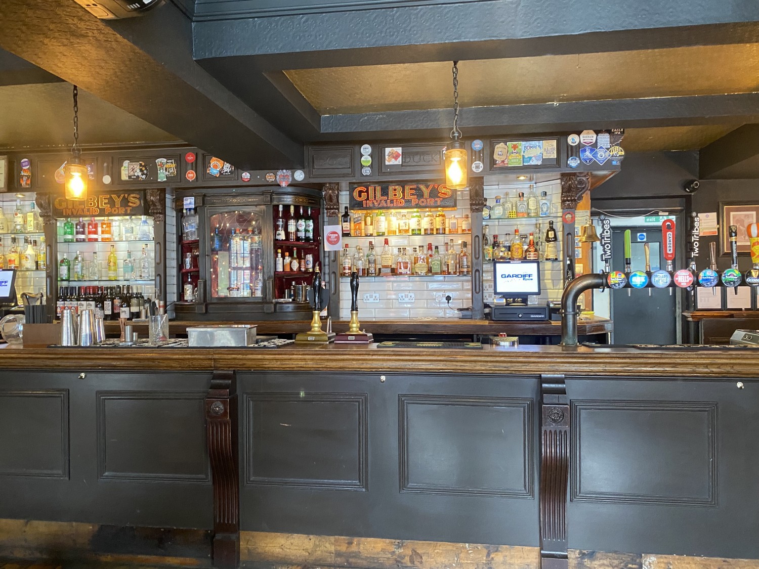 Pub bar area directly in front of the entrance.