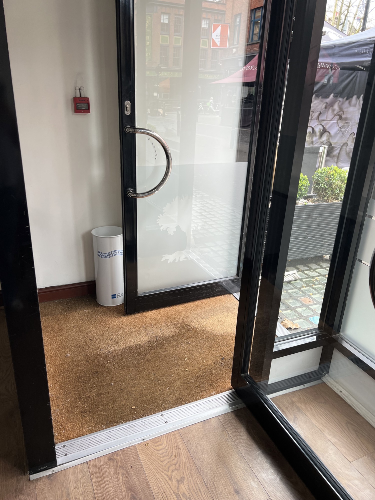 Photo taken from inside venue showing width of both entrance doors.