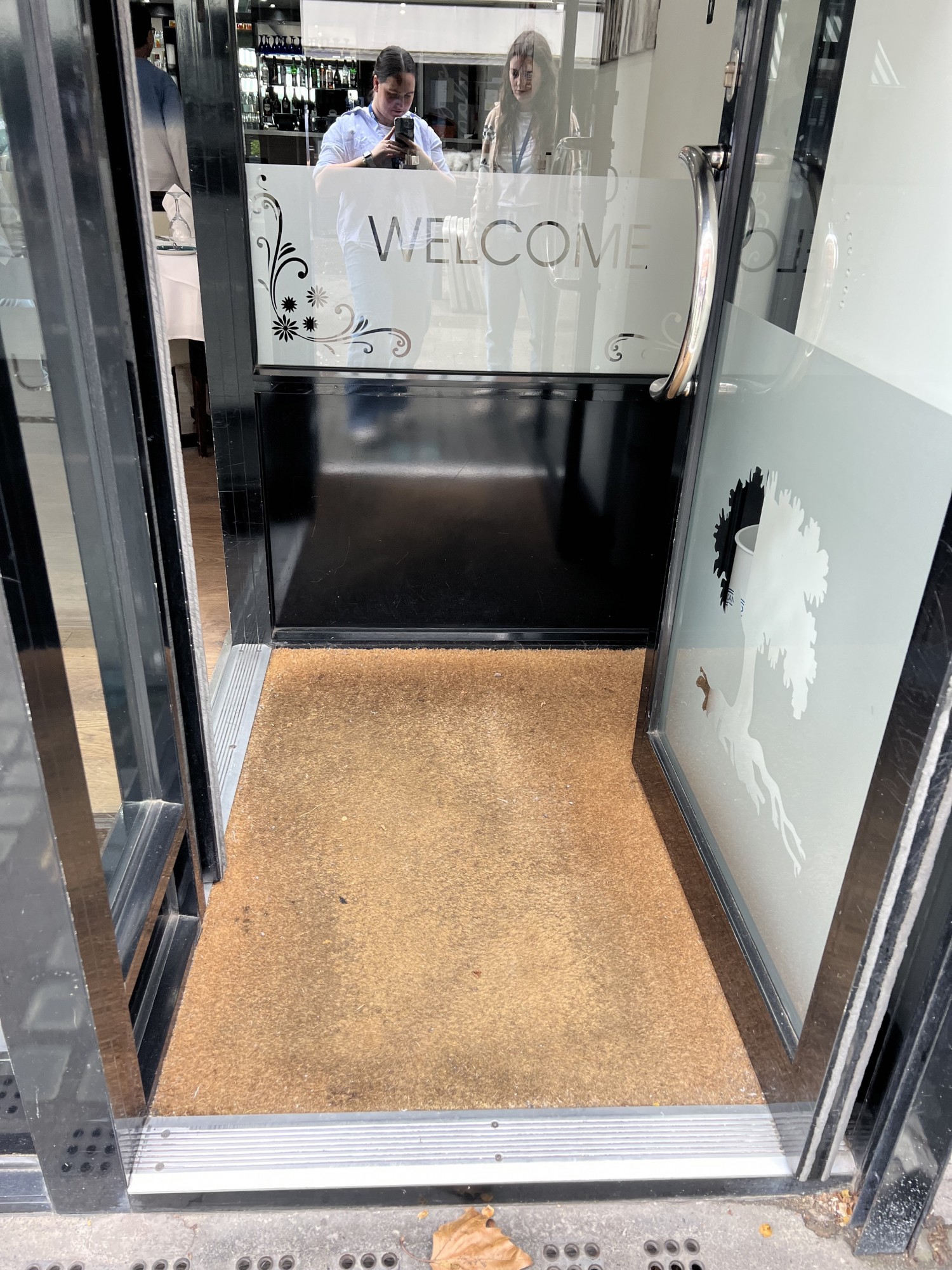 Photo taken from 1st door showing width and distance to 2nd door, before entering venue.