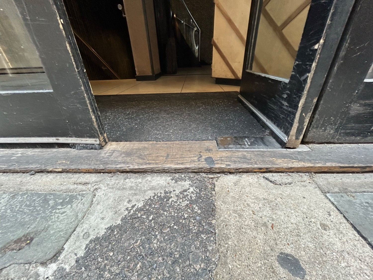 Small step before door.