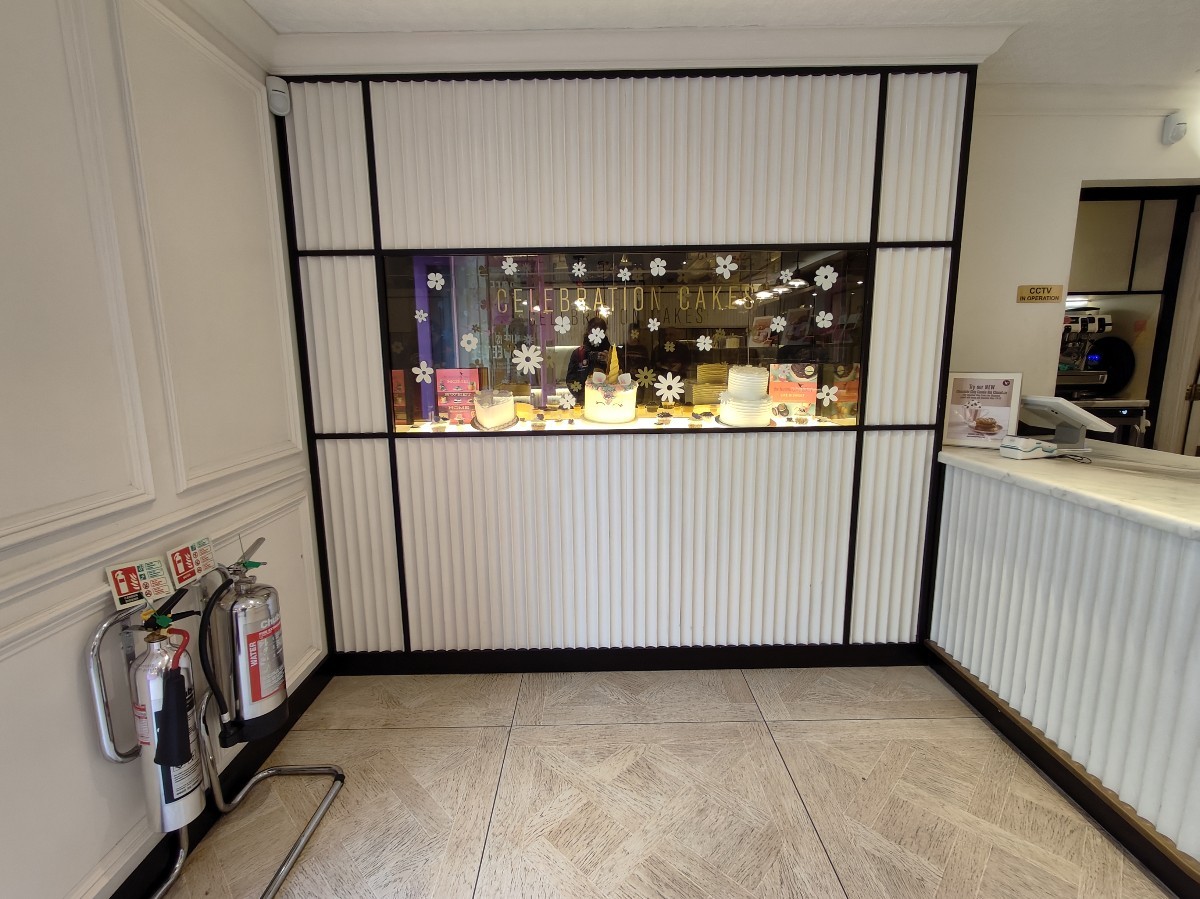 From entrance facing left. Display shelf at back.