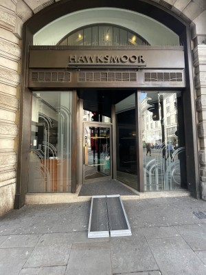 Main entrance located to the centre of venue front. Ramp upon request leading up to single door.