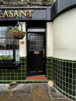 Photo of main entrance door. One step to door. Push to open.