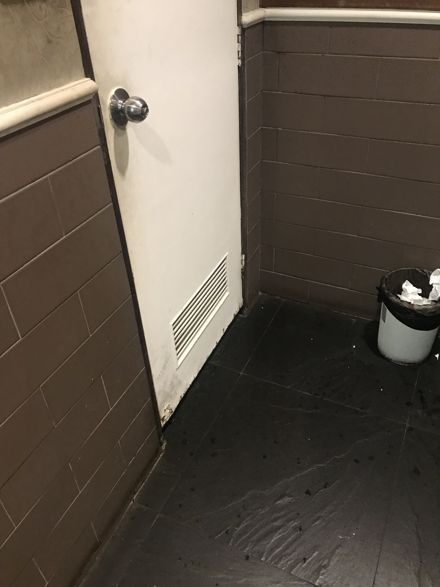 Step down into bathroom 
Door opens inward