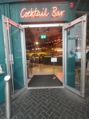 Doors opens in centre outwards. Push button to open on left.