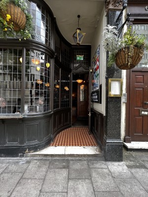 Pathway to entrance, right side of venue. Small step up. Main entrance door straight ahead.