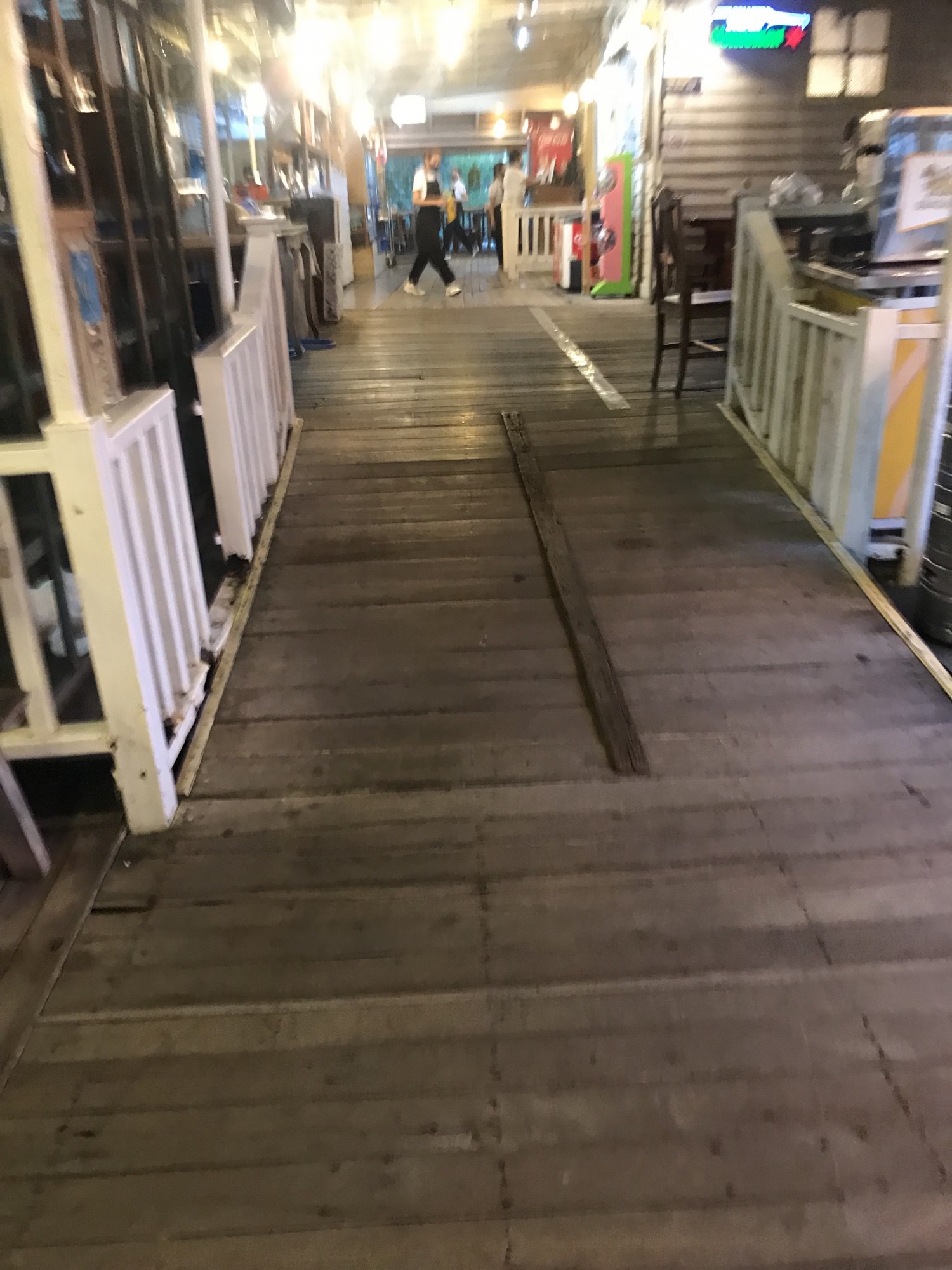 Built in ramps in floor to get up to bathroom then 2 steps down