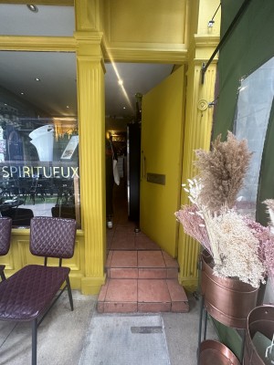 Main entrance. 2 steps followed by single wood door,  push. Handle on the left.