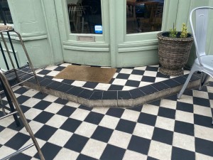 Close up view of step along main entrance.