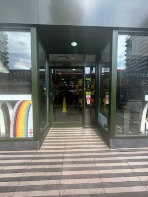 Automatic sliding doors at main entrance. Doors slide open to the right.