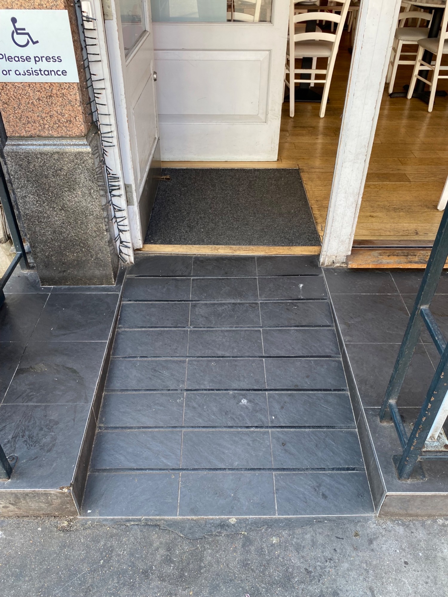 Close up of built in ramp that leads to main entrance door.