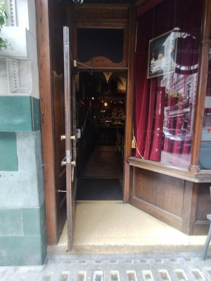 Small step leading up to main entrance. Door pulls open from the right.