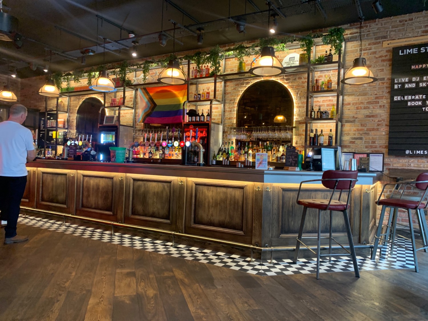 Bar area from right of entrance. Standing height with some bar stools.