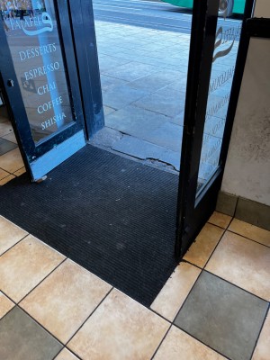 One side entrance is step free though there is a small crack in the paving.