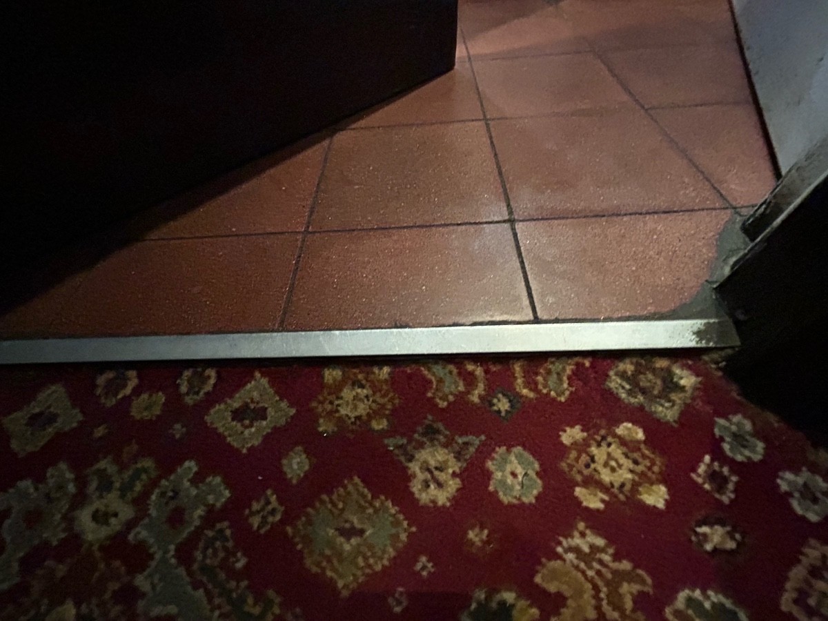 Small bump at foot of door.