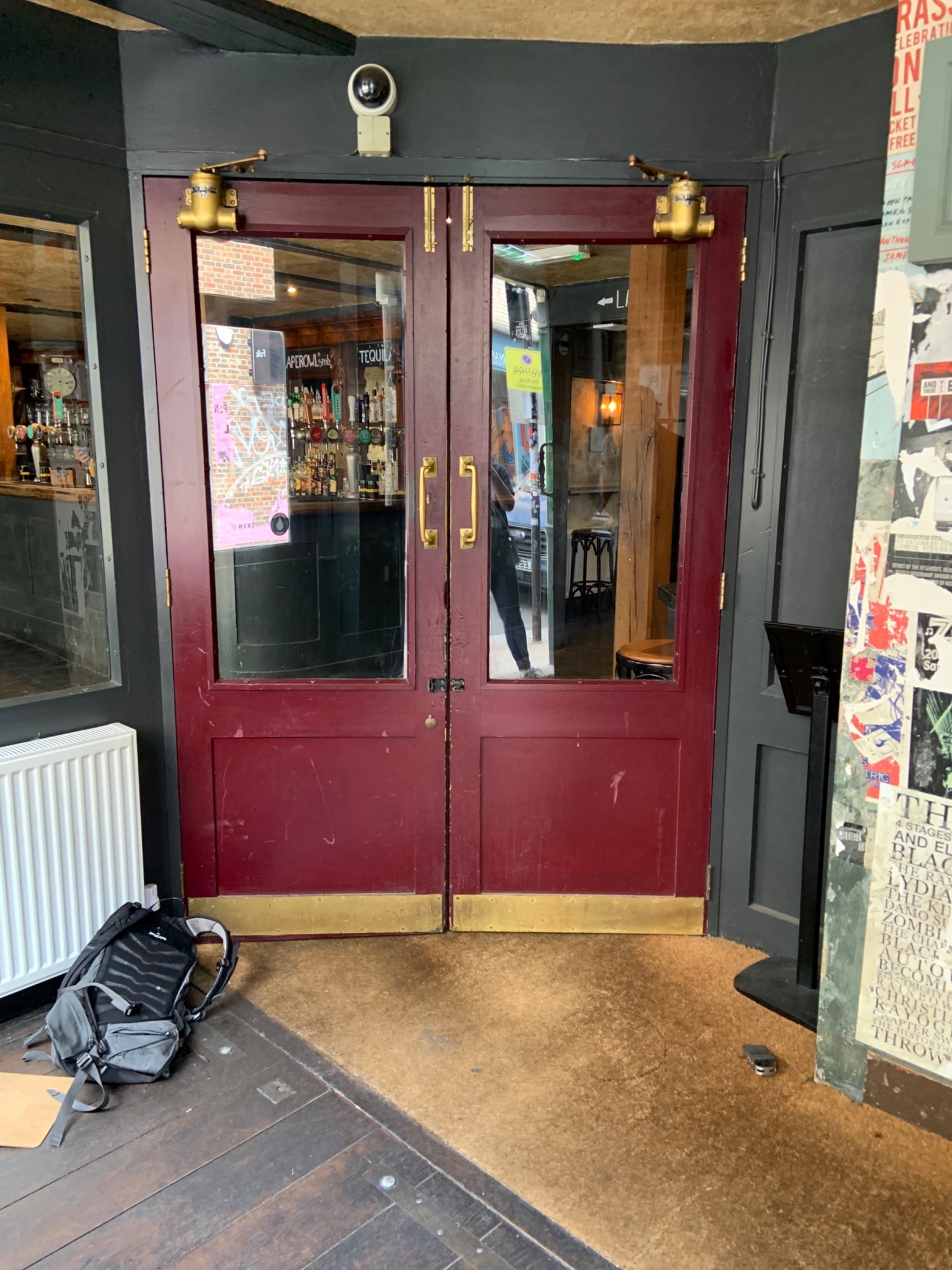 View from first set of doors looking left. Doors pull to open high in centre where doors meet.