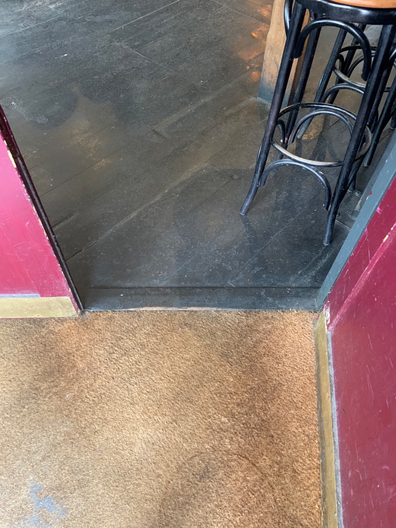 View of bump on threshold of second doors.