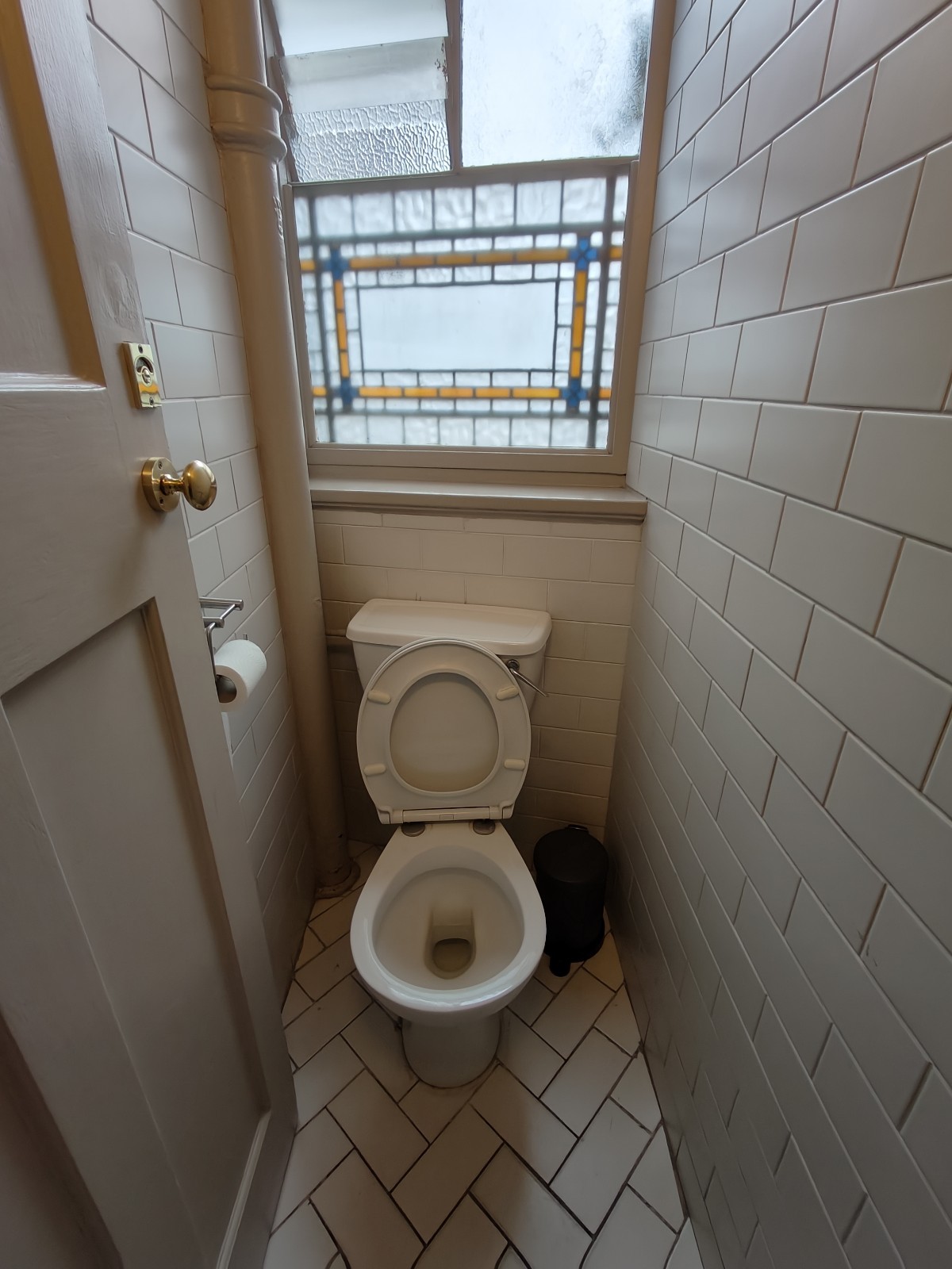 From toilet door facing straight. Toilet ahead.