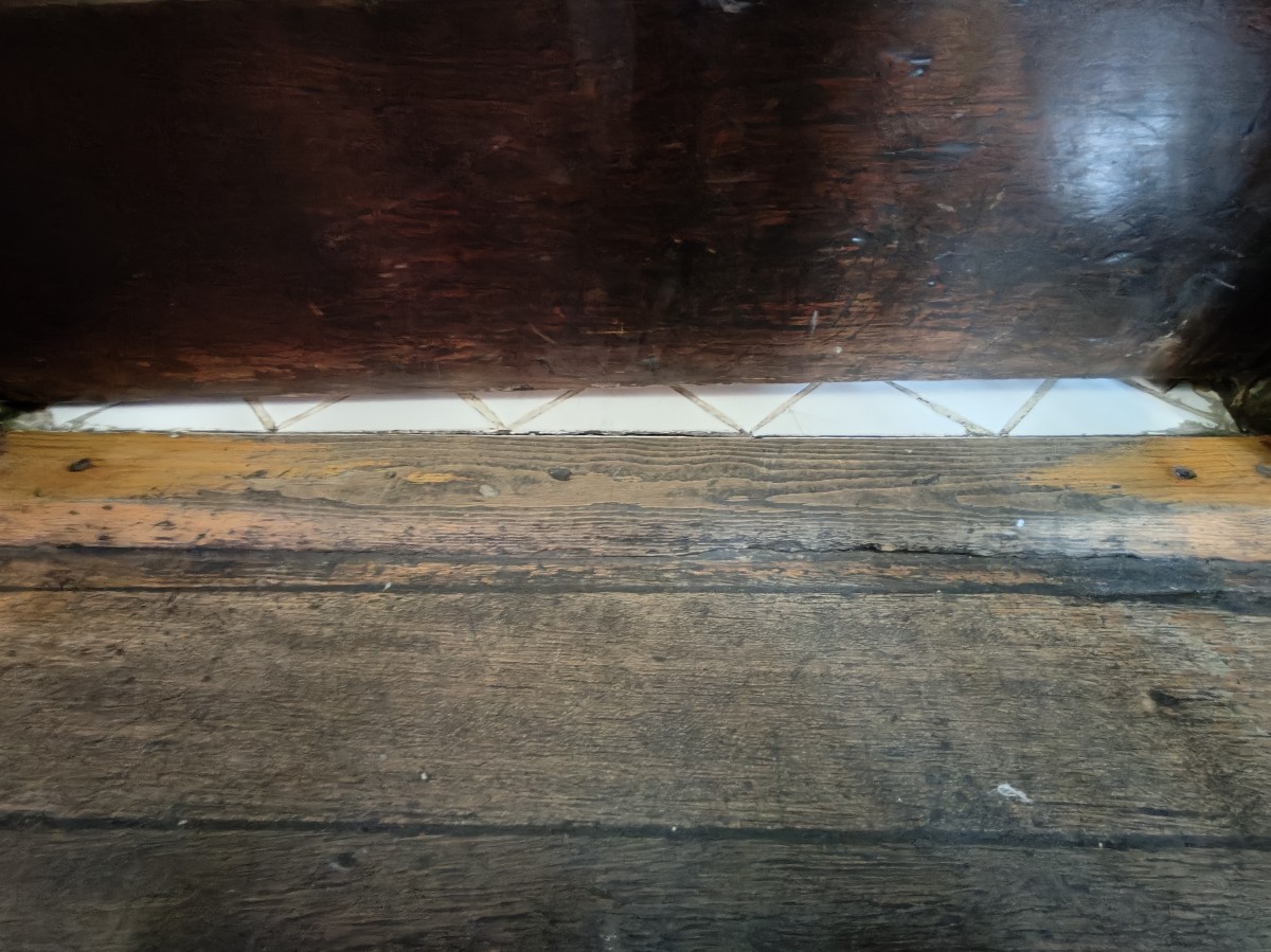 Small bump on threshold of door.