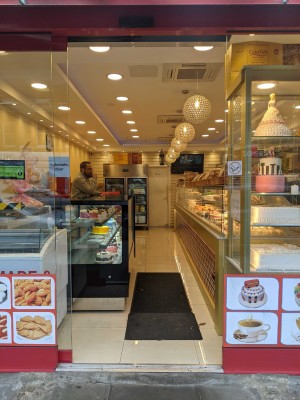 Glass doors ahead slide left and right automatically.