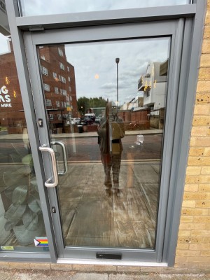 Push door from left to open. Handle at seat height.