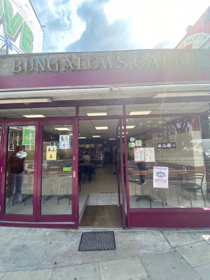 Single glass door opens inwards. Push handle on the left hand side