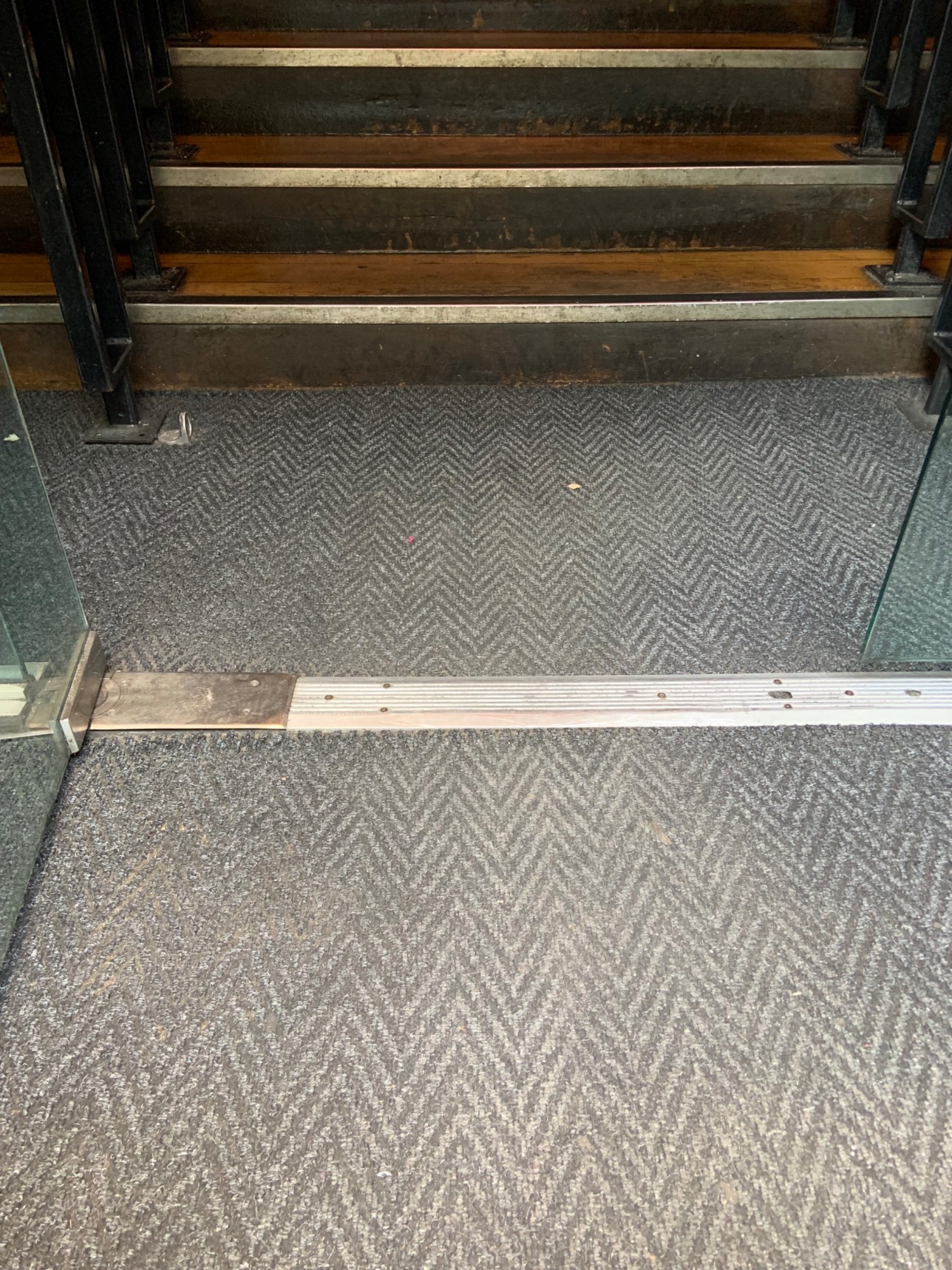 Small bump on threshold of second door.