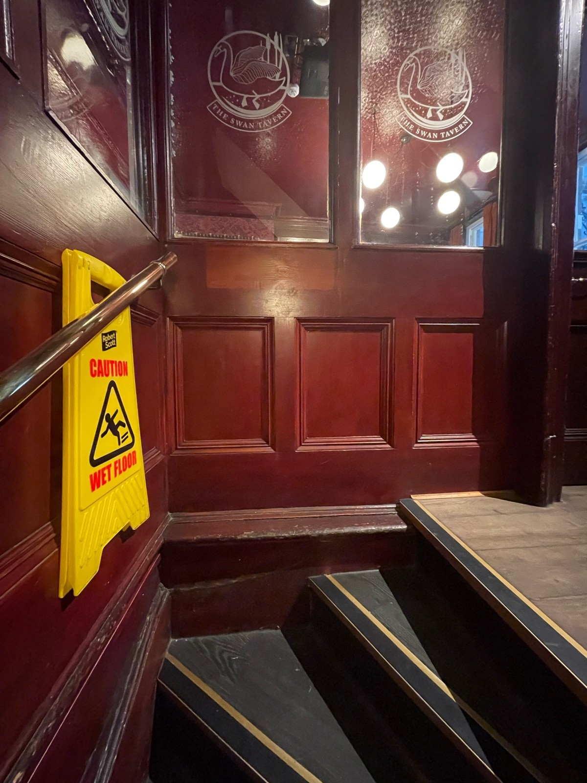 From second curve facing right. Stairs continue to curve, three steps to top. Handrail on left.