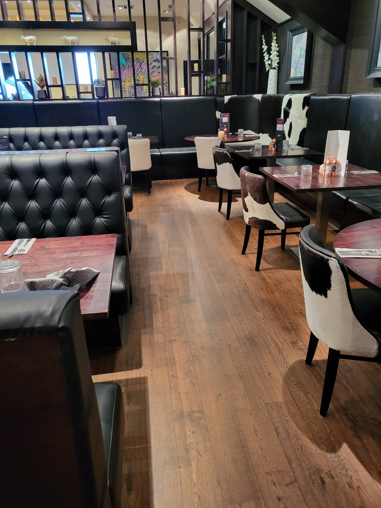 Some fixed and moveable furniture 
Pathway is wide