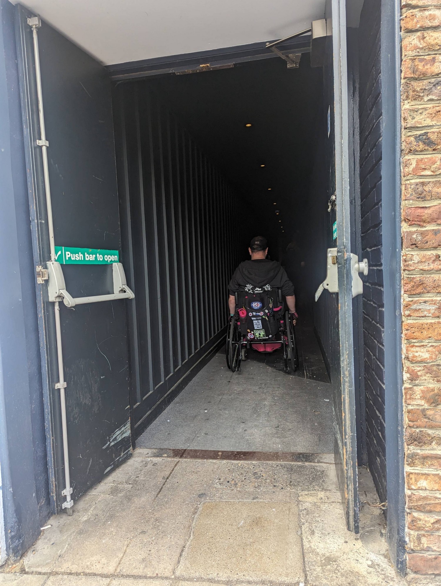 Long corridor down side of venue (sheltered)