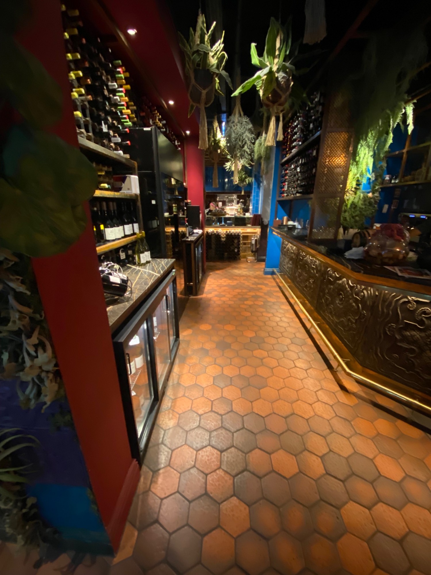 From entrance facing right. Wide pathway leading to bar. At bar, turn left.
