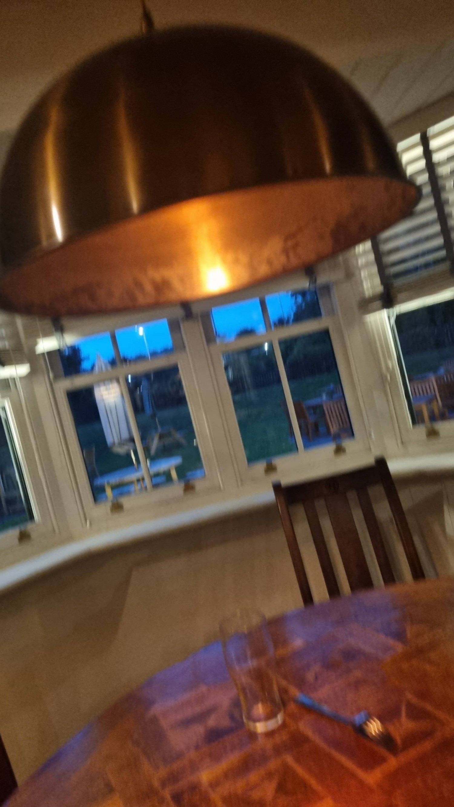 Low lighting over tables. Plenty of window light