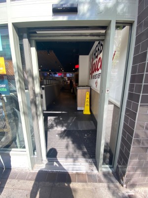 Facing entrance straight ahead. Leads to corridor leading to main area straight ahead, and entrance to main area directly to left.
